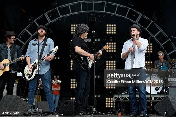 Guitarist James Young of the Eli Young Band, singer/guitarist Randy Owen of Alabama and frontman Mike Eli of the Eli Young Band rehearse onstage...