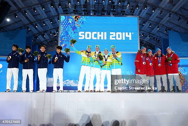 Bronze medalists Noriaki Kasai, Daiki Ito, Taku Takeuchi and Reruhi Shimizui of Japan, gold medalists Severin Freund, Andreas Wellinger, Marinus...