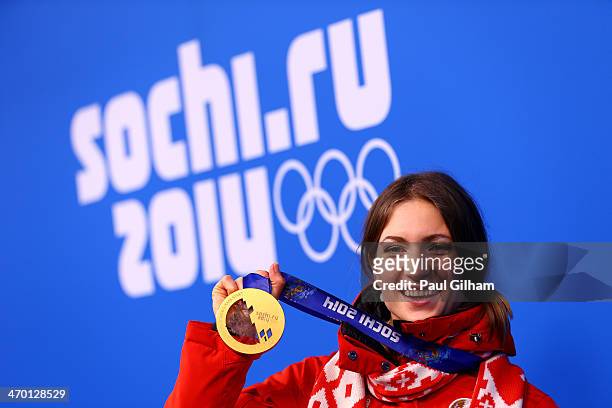 Gold medalist Darya Domracheva of Belarus celebrates during the medal ceremony for the Women's 12.5 km Mass Start on day 11 of the Sochi 2014 Winter...