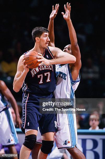 Gheorghe Muresan of the New Jersey Nets during the game against the Charlotte Hornets on November 12, 1999 at Continental Airlines Arena in East...
