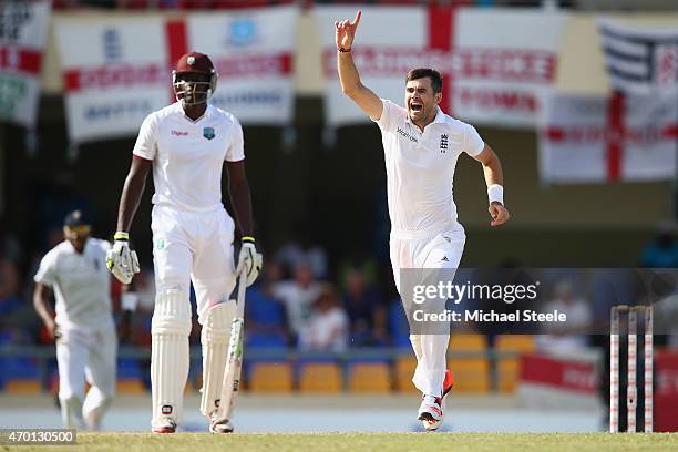 James Anderson of England claims the wicket of Denesh Ramdin of West Indies to pass Sir Ian Botham's record of 383 Test wickets and become England's...