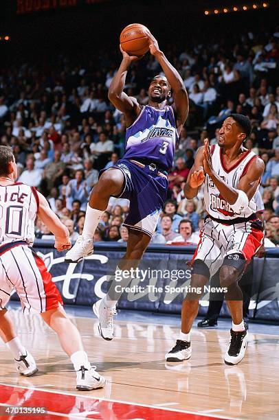 Bryon Russell of the Utah Jazz shoots during the game against the Houston Rockets on April 30, 1999 at Compaq Center in Houston, Texas.