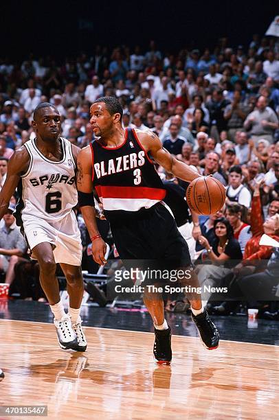Damon Stoudamire of the Portland Trail Blazers moves the ball during the game against the San Antonio Spurs on May 31, 1999 at the Alamodome in San...