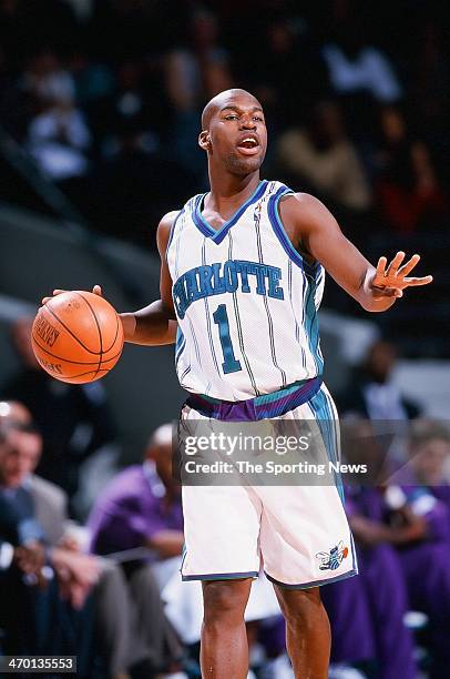 Baron Davis of the Charlotte Hornets moves the ball during the game against the Indiana Pacers on November 4, 1999 at Charlotte Coliseum in...