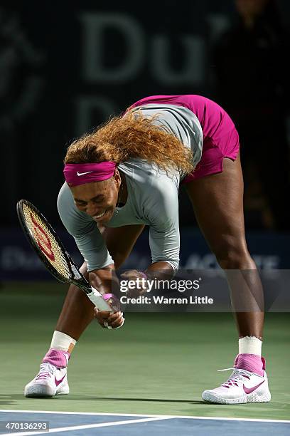 Serena Williams of the USA celebrates winning a game against Ekaterina Makarova of Russia during day two of the WTA Dubai Duty Free Tennis...