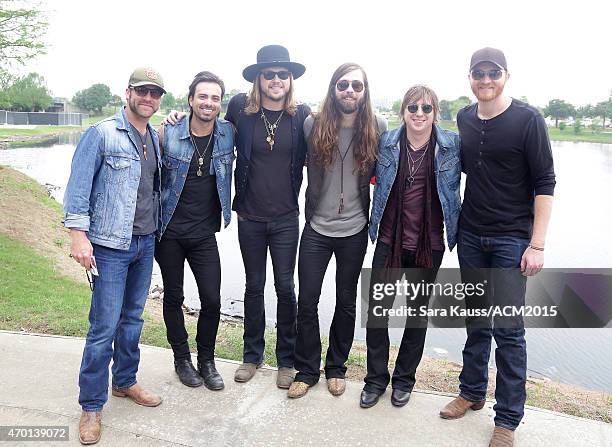 Singer Zach Brown, Michael Hobby, Graham Deloach and Bill Satcher of A Thousand Horses and Eric Paslay attend the ACM Party For A Cause Festival at...