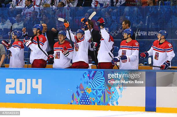 Czech Republic bench players celebrate after an open net goal by Tomas Plekanec in the third period against Slovakia during the Men's Qualification...