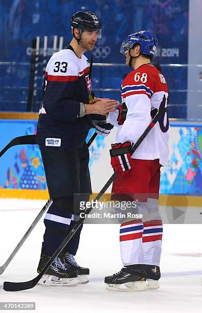 Zdeno Chara of Slovakia shakes hands with Jaromir Jagr of Czech Republic after the Men's Qualification Playoff Game on day 11 of the Sochi 2014...