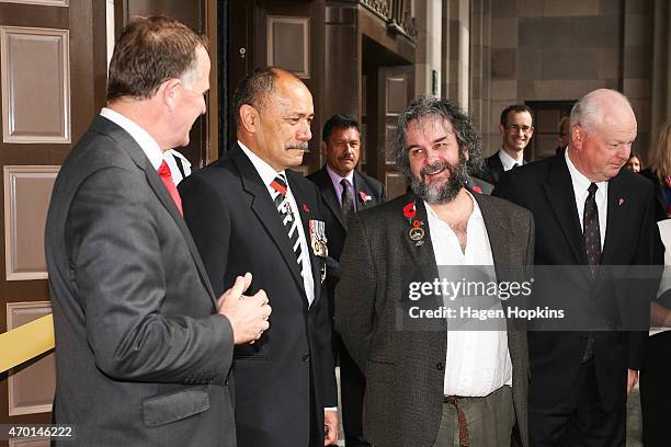 Governor-general Sir Jerry Mateparae and Prime Minister John Key, officially open the Great War exhibition as Sir Peter Jackson looks on during the...