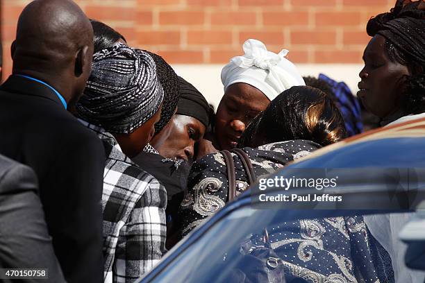 Akon Guode at the funeral of her 3 children Bol, Anger and Madit who were tragically killed when she veered off the road at Wyndham Lakes on April 8...