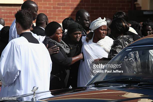 Akon Guode at the funeral of her 3 children Bol, Anger and Madit who were tragically killed when she veered off the road at Wyndham Lakes on April 8...