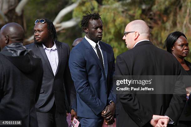 Majak Daw attended the funeral of children Bol, Anger and Madit who were tragically killed when their mother Akon Goude veered off the road at...