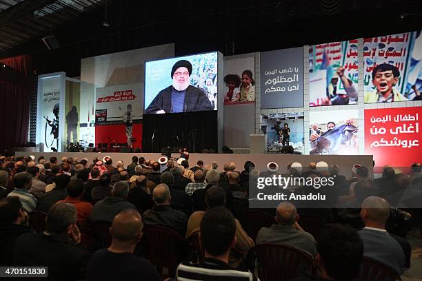 Hezbollah chief Hassan Nasrallah speaks via video conference in Beirut on April 17, 2015 during a meeting in support of Yemeni people.