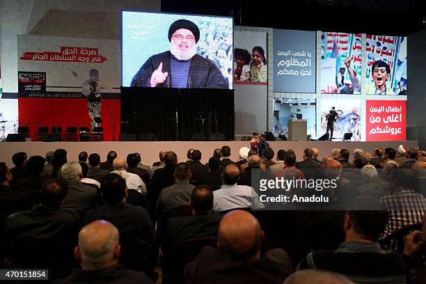 Hezbollah chief Hassan Nasrallah speaks via video conference in Beirut on April 17, 2015 during a meeting in support of Yemeni people.