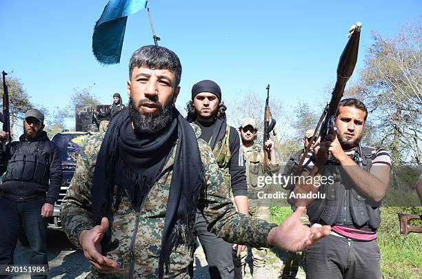 Commander of Sultan Abdul Hamid Khan brigade, Omar Abdullah speaks when Turkmen troops arrive to deploy at the mountains in fight agains Syrian...