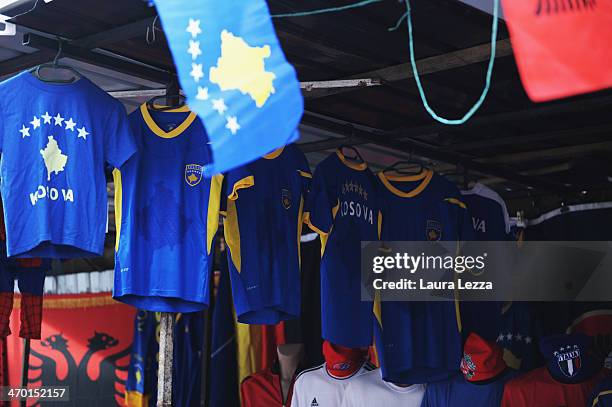 Kosovo national football shirts are displayed in a market place the day after the parade for the sixth anniversary of Kosovo's declaration of...