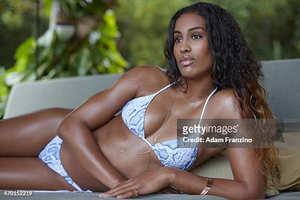 Swimsuit Issue 2014: Basketball player Skylar Diggins poses for the 2014 Sports Illustrated Swimsuit issue on November 20, 2013 on Guana Island....
