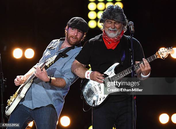 Guitarist James Young of the Eli Young Band and singer/guitarist Randy Owen of Alabama perform onstage during ACM Presents: Superstar Duets at Globe...