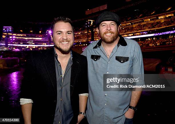 Musicians Mike Eli and James Young of the Eli Young Band attend ACM Presents: Superstar Duets at Globe Life Park in Arlington on April 17, 2015 in...