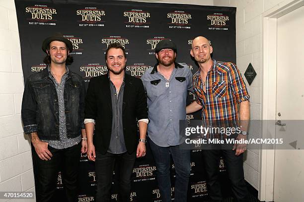 Musicians Chris Thompson, Mike Eli, James Young and Jon Jones of the Eli Young Band attend ACM Presents: Superstar Duets at Globe Life Park in...