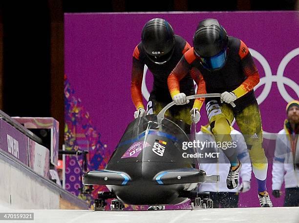 The Germany 2 team of Cathleen Martini and Christin Senkel start their first-heat run in the women's bobsleigh at the Sanki Sliding Centre, during...