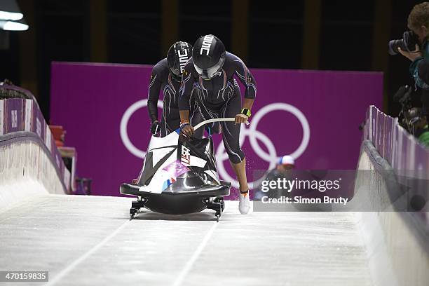 Winter Olympics: USA 3 Jazmine Fenlator and Lolo Jones in action during start of Two-Woman Bobsled Heat 1 at Sanki Sliding Center. Krasnaya Polyana,...