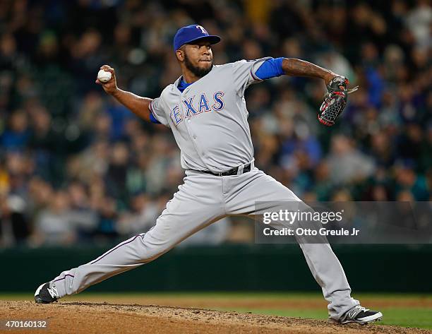 Closing pitcher Neftali Feliz of the Texas Rangers pitches in the ninth inning against the Seattle Mariners at Safeco Field on April 17, 2015 in...