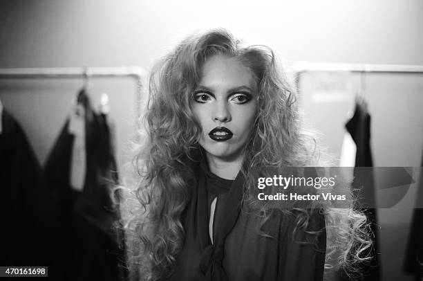 Model gets ready at the backstage during the Page Show as part of Mercedes-Benz Fashion Week Mexico Fall/Winter 2015 at Campo Marte on April 17, 2015...