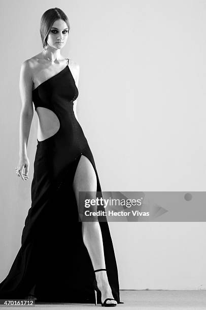 Model walks the runway during the Page Show as part of Mercedes-Benz Fashion Week Mexico Fall/Winter 2015 day 4 at Campo Marte on April 17, 2015 in...