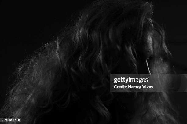 Model gets ready at the backstage during the Page Show as part of Mercedes-Benz Fashion Week Mexico Fall/Winter 2015 at Campo Marte on April 17, 2015...