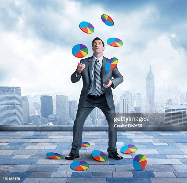 businessman juggling and losing control - juggling stock pictures, royalty-free photos & images