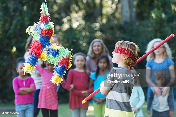 Pinata Injuries 67 Adults Hitting Pinata Stock Photos, High-Res Pictures, and Images ...