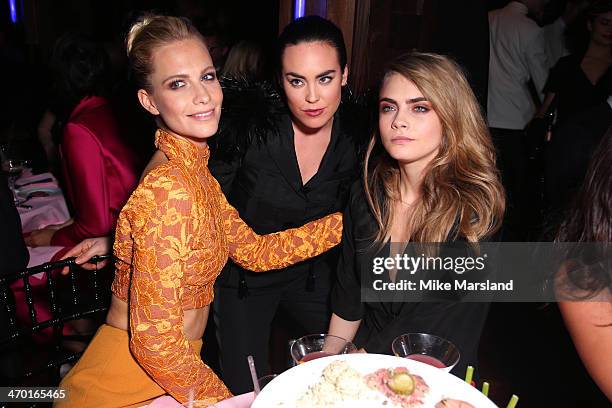 Models Poppy Delevingne, Tallulah Harlech and Cara Delevingne attend the party at the Elle Style Awards 2014 at one Embankment on February 18, 2014...