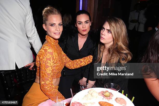 Models Poppy Delevingne, Tallulah Harlech and Cara Delevingne attend the party at the Elle Style Awards 2014 at one Embankment on February 18, 2014...