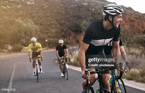 he's enjoying the ride - cicloturismo stockfoto's en -beelden