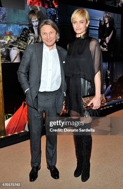 Designer Leon Max and model/actress Amber Valletta attend "W Stories" presented by Leon Max and hosted by Stefano Tonchi, Leon Max and Amber Valletta...