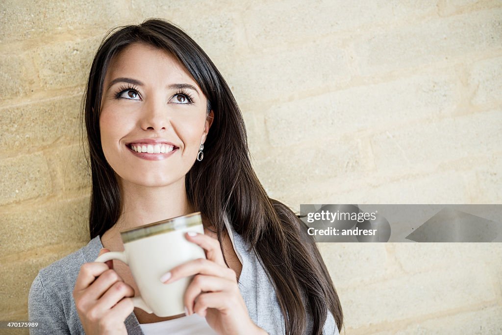 Woman having a hot drink