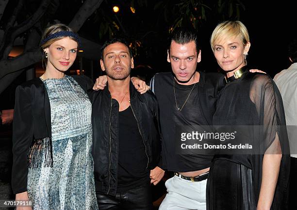 Model Angela Lindvall, photographers Mert Alas and Marcus Piggott and model/actress Amber Valletta attend "W Stories" presented by Leon Max and...