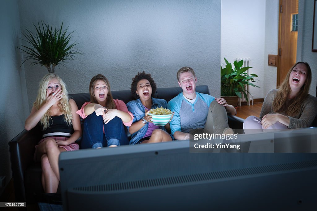 Teenagers Friends Watching Funny TV Streaming Broadcast Movie Show