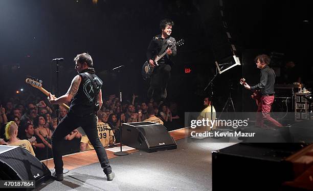 Billie Joe Armstrong, Tre Cool and Mike Dirnt of Green Day perform onstage at House Of Blues on April 16, 2015 in Cleveland, Ohio.