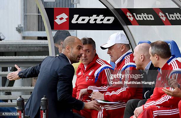 Josep Guardiola , head coach of Muenchen talks to Manager Matthias Sammer of Munich and Doctor Volker Braun, new club doctor of Muenchen during the...