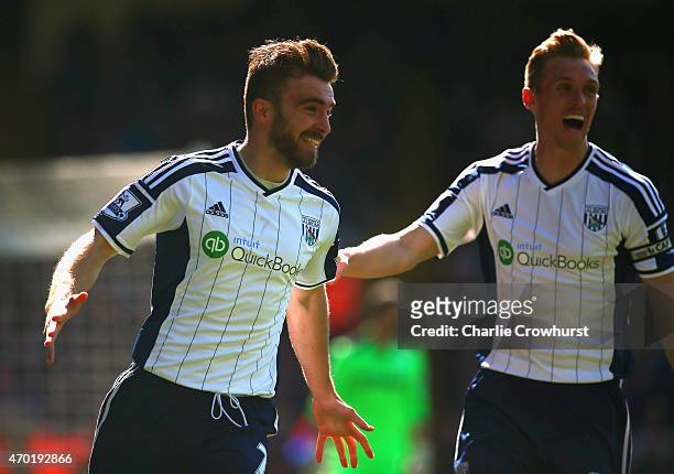 James Morrison of West Brom celebrates scoring the opening goal with Darren Fletcher of West Brom during the Barclays Premier League match between...