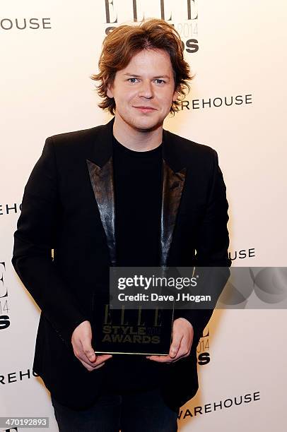 Christopher Kane poses in the winners room at the Elle Style Awards 2014 at one Embankment on February 18, 2014 in London, England.