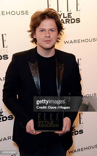 Christopher Kane poses in the winners room at the Elle Style Awards 2014 at one Embankment on February 18, 2014 in London, England.