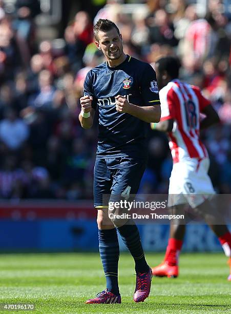 Morgan Schneiderlin of Southampton celebrates scoring the first goal during the Barclays Premier League match between Stoke City and Southampton at...