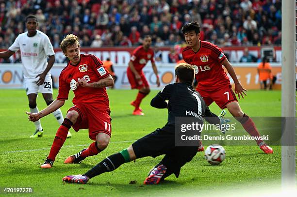 Stefan Kiessling of Bayer Leverkusen scores the fourth goal during the Bundesliga match between Bayer 04 Leverkusen and Hannover 96 at BayArena on...