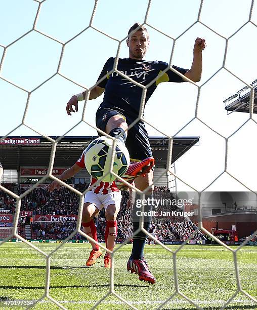 Morgan Schneiderlin of Southampton scores the first goal during the Barclays Premier League match between Stoke City and Southampton at the Britannia...
