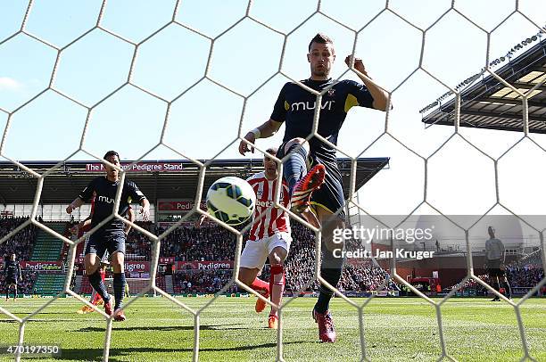 Morgan Schneiderlin of Southampton scores the first goal during the Barclays Premier League match between Stoke City and Southampton at the Britannia...