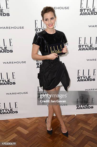 Emma Watson poses in the winners room at the Elle Style Awards 2014 at one Embankment on February 18, 2014 in London, England.