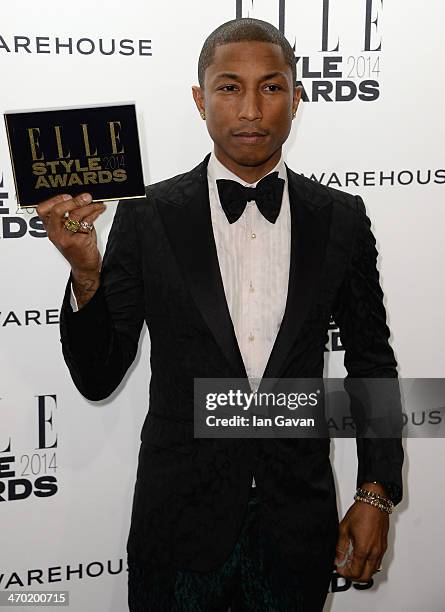 Pharrell Williams poses in the winners room at the Elle Style Awards 2014 at one Embankment on February 18, 2014 in London, England.